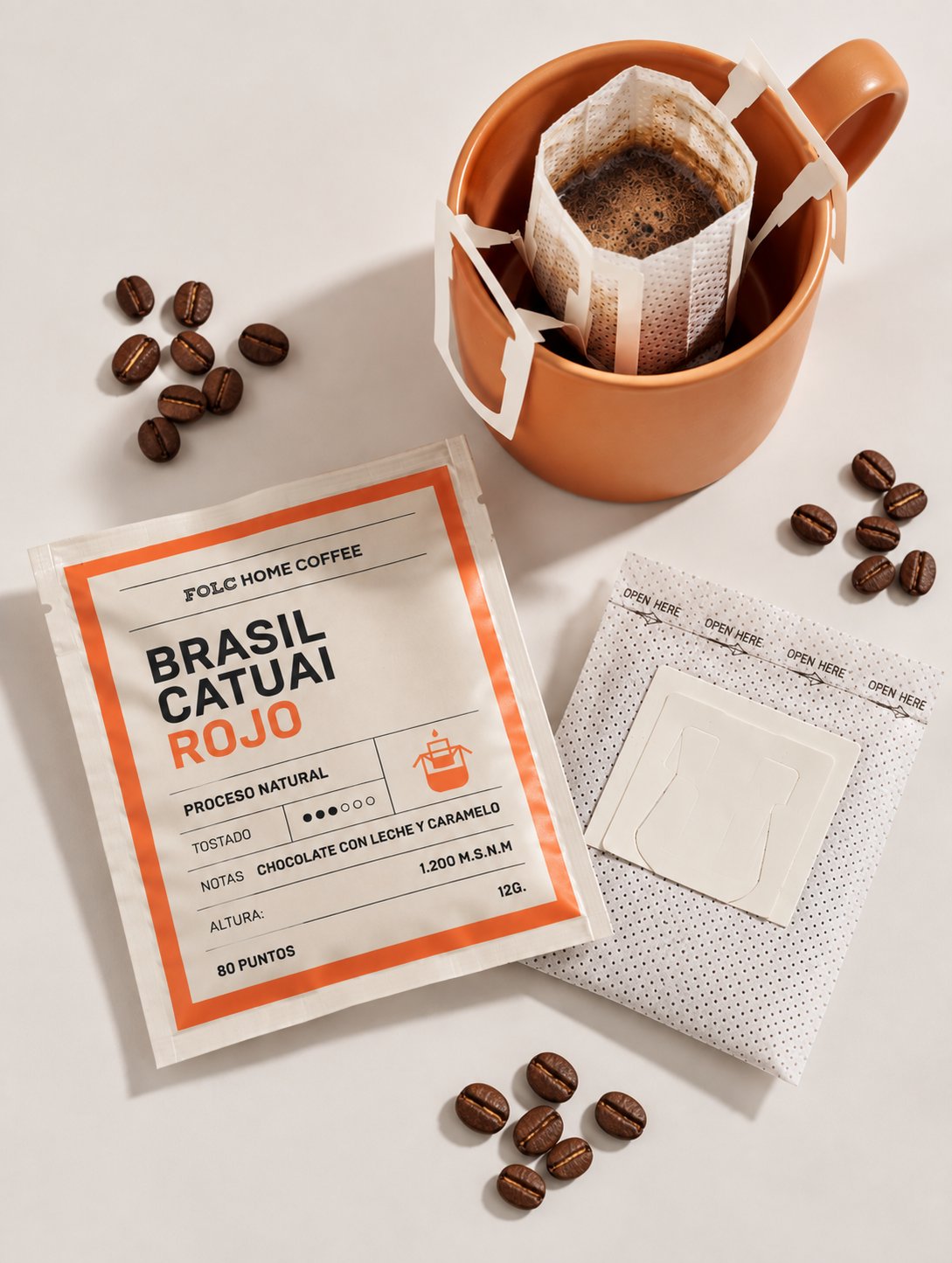 Drip bag Brasil Catuai Rojo junto a una taza con el filtro armado